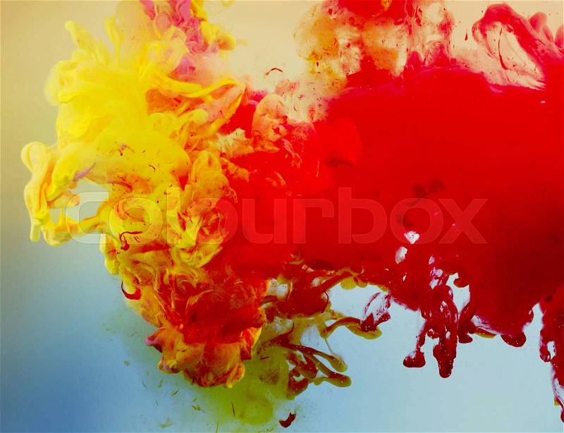 Acrylic colors and ink in water. Abstract background, stock photo