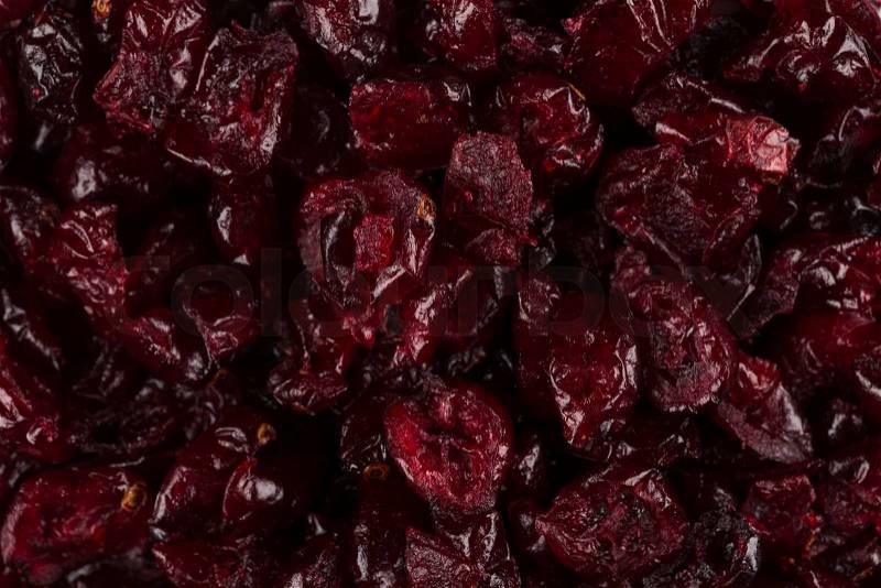 Pieces of dried cranberries close up for background, stock photo