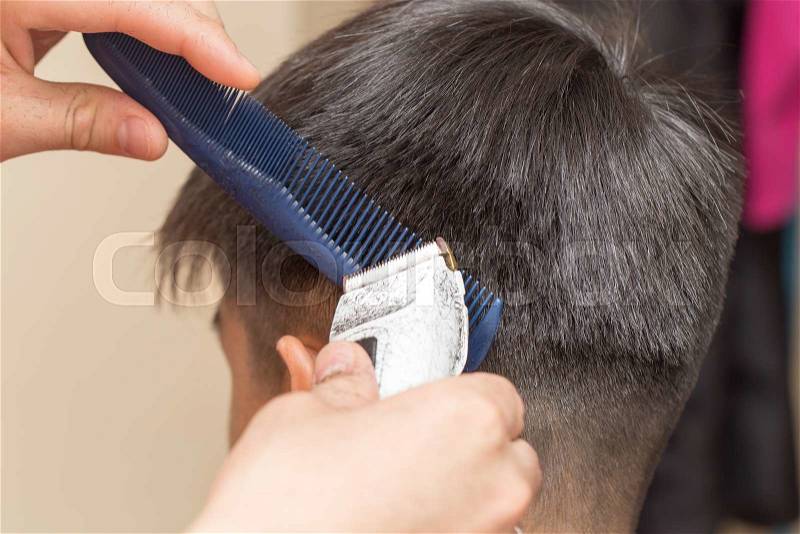 Men\'s haircut at the beauty salon, stock photo