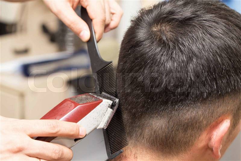 Men\'s haircut at the beauty salon, stock photo