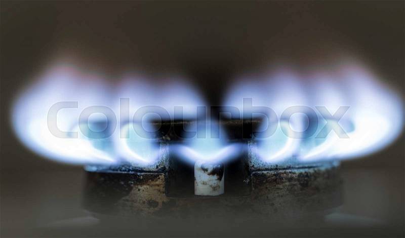 Blue flame of natural gas fire as the background, stock photo