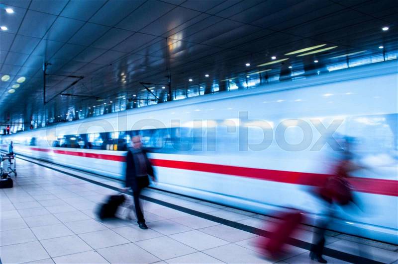 Frankfurt Airport Train station with blur business people movement in rush hour, stock photo