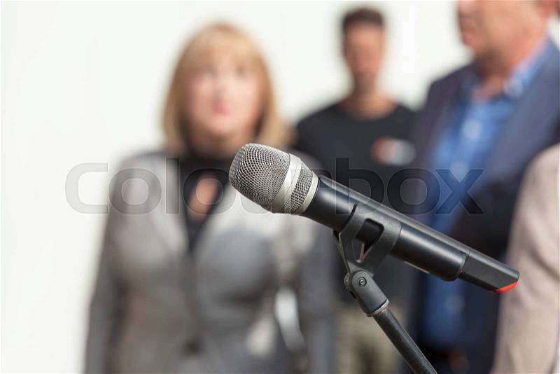 News conference. Microphone, stock photo