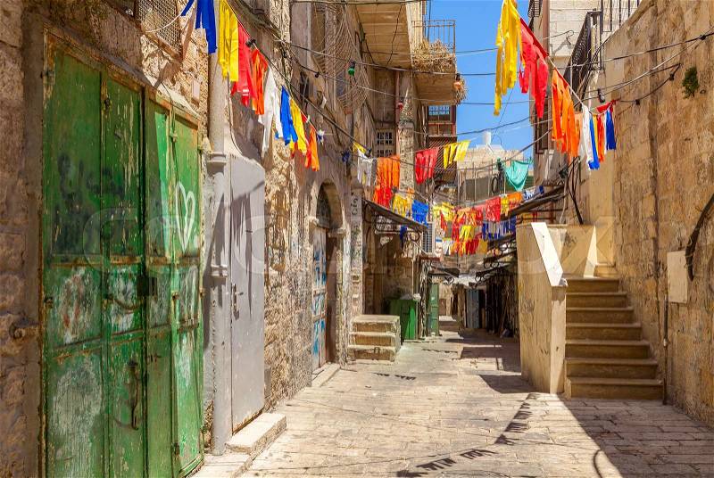 Narrow street in arab quarter of Old City in Jerusalem, Israel, stock photo