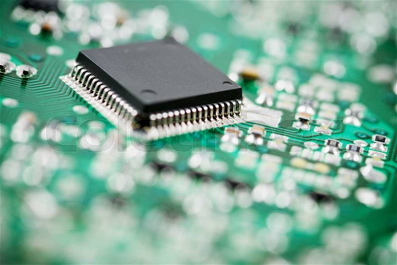 Chip close up on a integrated circuit, stock photo