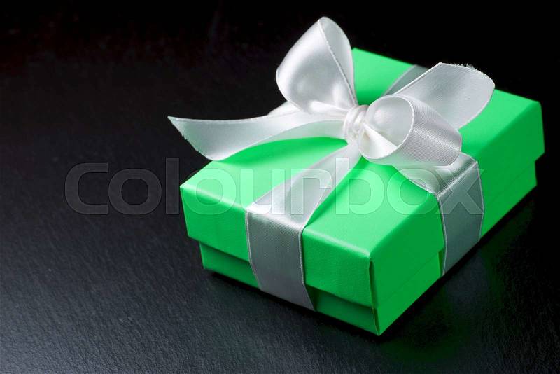 Luxury box tied with a white ribbon, stock photo