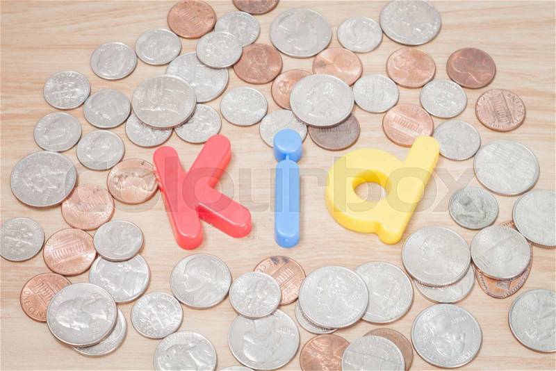 Kid alphabet with various US coins, stock photo, stock photo