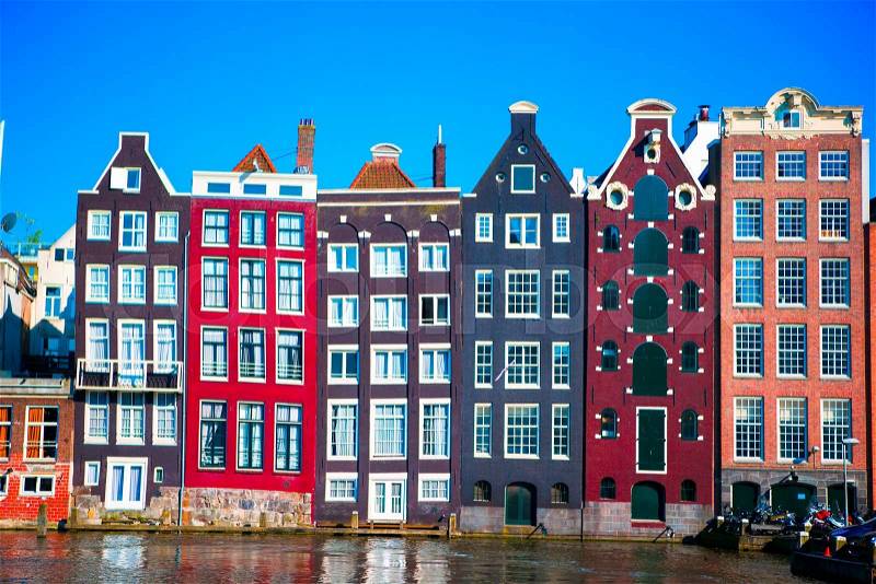 Traditional dutch medieval houses in Amsterdam, Netherlands, stock photo
