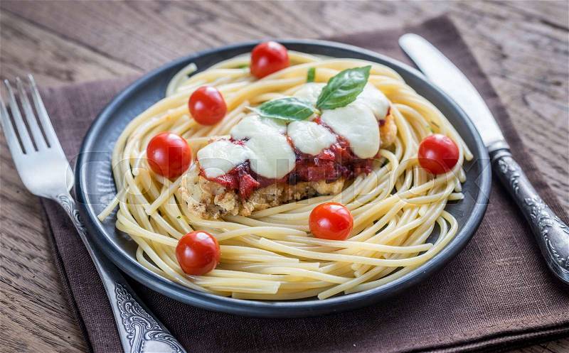 Baked chicken with parmesan and mozzarella, stock photo