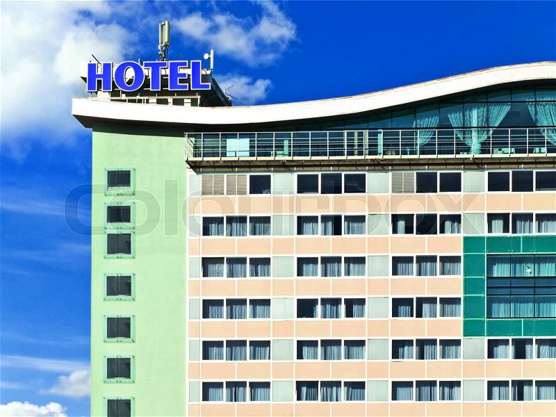 Modern hotel building against blue sky, stock photo