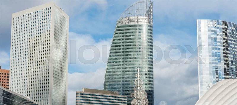 PARIS - NOVEMBER 22, 2012: Tall buildings in the major business district, La Defense, in the western side of Paris, France. Here are many of the Paris urban area\'s tallest high-rises, stock photo