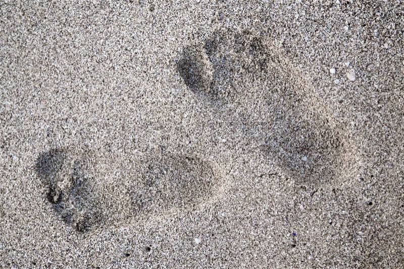 Footprints in the sand prints, stock photo