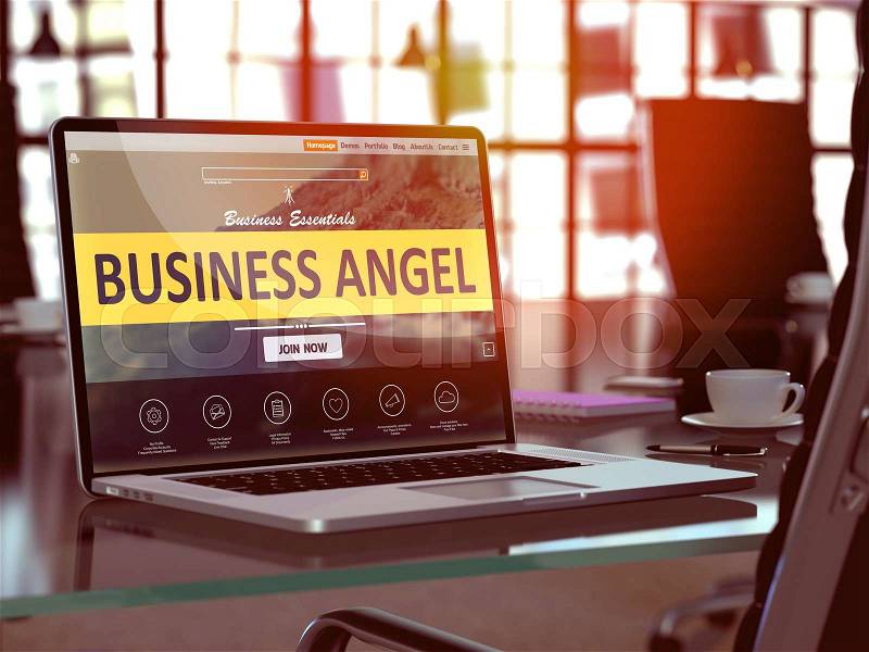 Modern Workplace with Laptop showing Landing Page with Business Angel Concept. Toned Image with Selective Focus, stock photo