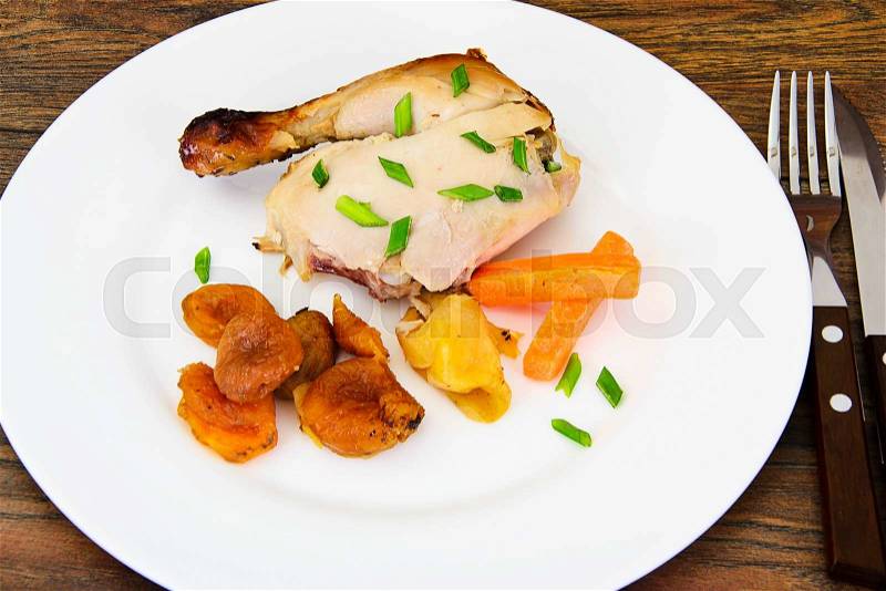 Chicken Ham, Baked with Dried Apricots, Apples and Carrots Studio Photo, stock photo