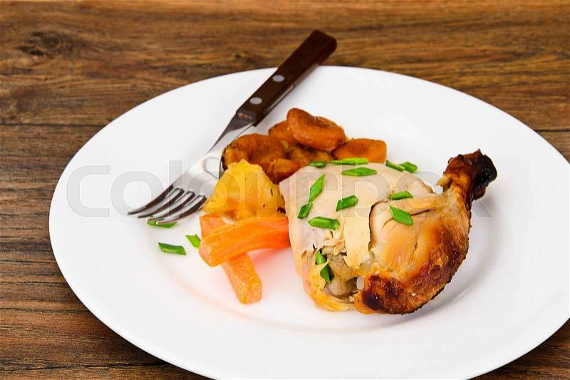 Chicken Ham, Baked with Dried Apricots, Apples and Carrots Studio Photo, stock photo