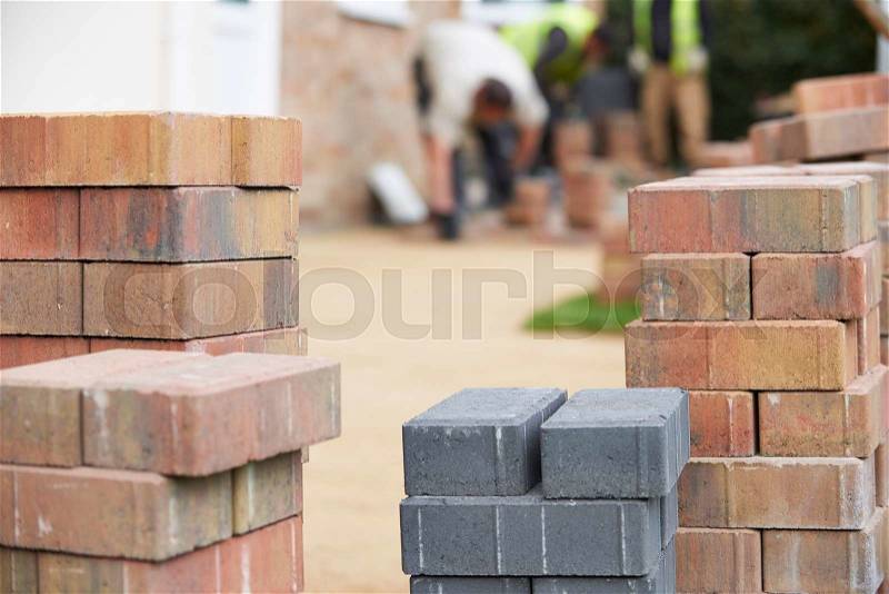 Close Up Of Blocks Waiting To Be Laid On New Patio, stock photo