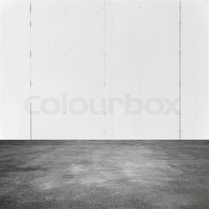 Empty square abstract interior background with white metal wall and asphalt pavement, stock photo