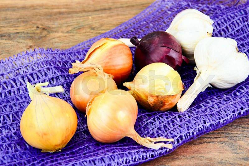 Onions, Mesh, Storage in Winter Studio Photo, stock photo