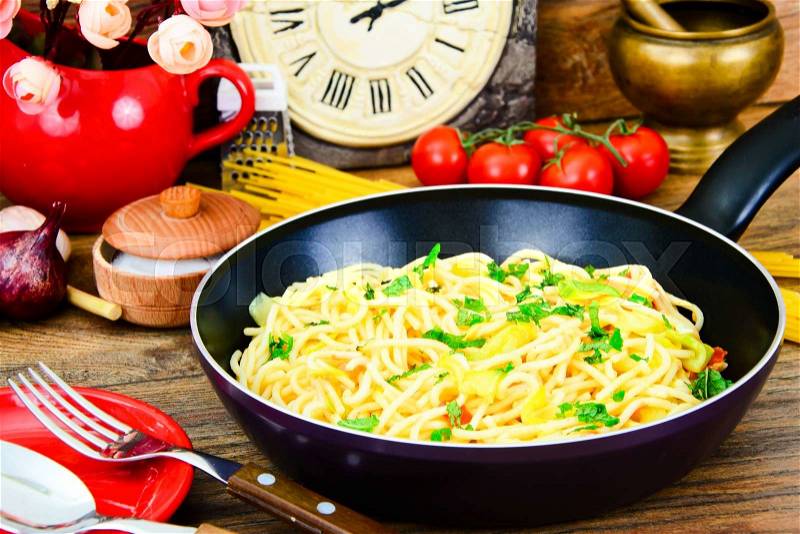 Spaghetti with Zucchini, Tomatoes, Parmesan Cheese, Garlic Studio Photo, stock photo