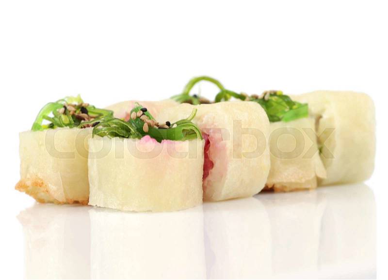 Sushi hot rolls with shrimp, cheese, tuna, wakame seaweed on white, stock photo