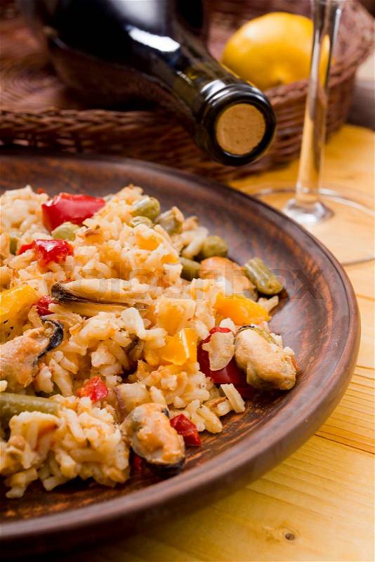 National dish of Spain - Fish paella. A dish which uses the spice saffron, stock photo