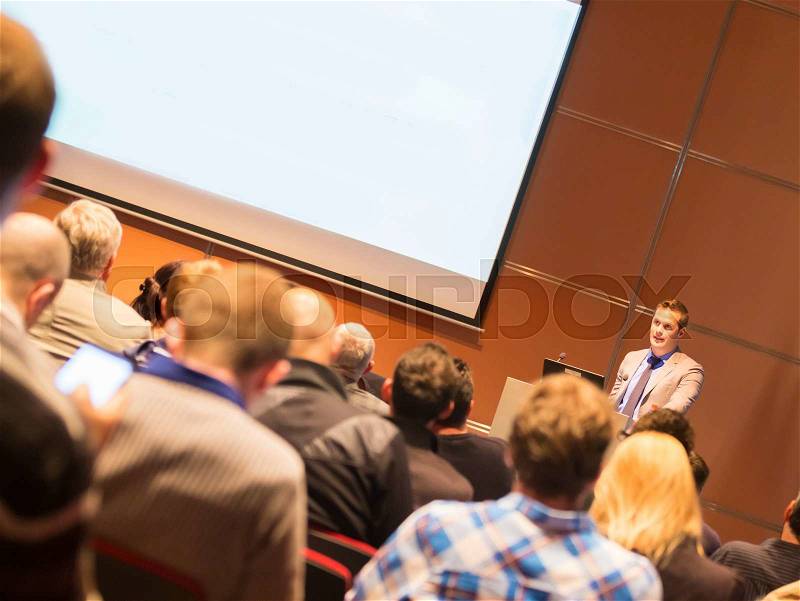 Speaker at Business Conference and Presentation. Audience at the conference hall. Business and Entrepreneurship, stock photo
