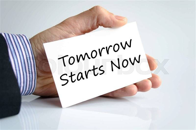 Tomorrow starts now text concept isolated over white background, stock photo