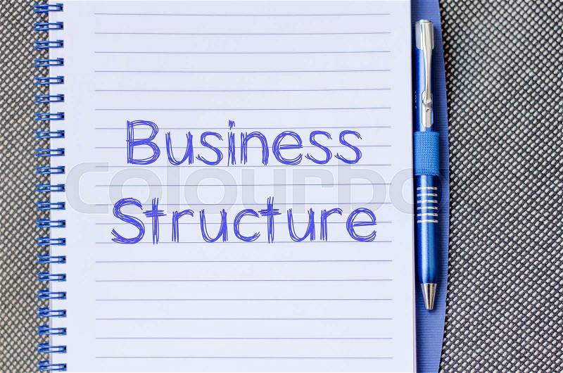 Business structure text concept write on notebook with pen, stock photo
