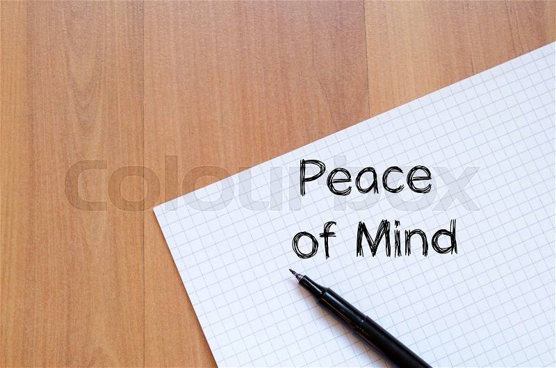 Peace of mind text concept write on notebook with pen, stock photo