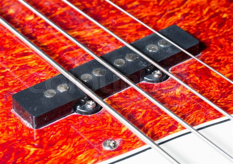 Bass Guitar Pickups Close Up macro image, stock photo