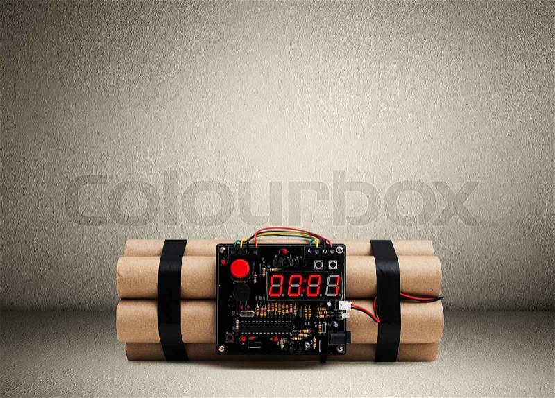 Bomb with timer on the floor in room, stock photo