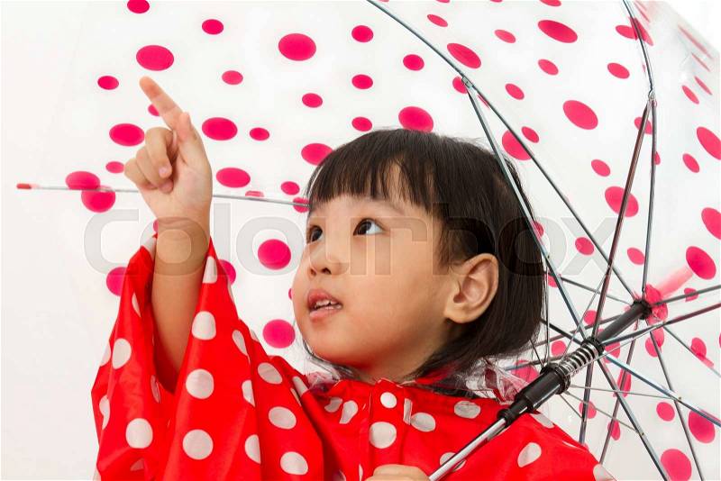 Chinese Little Girl Holding umbrella with raincoat in plain white isolated background, stock photo