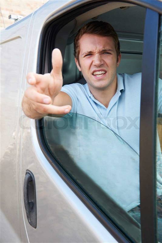 Angry Driver At Wheel Of Van, stock photo