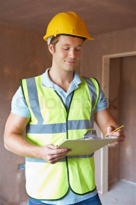 Building Inspector Looking At New Property, stock photo