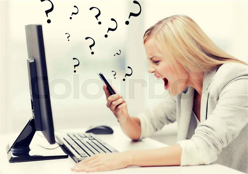 Picture of angry woman shouting at phone, stock photo