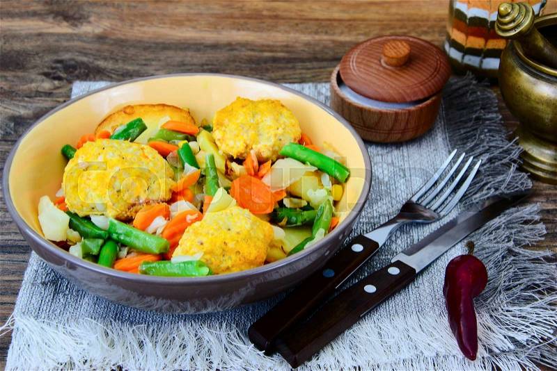 Steamed Vegetables Potatoes, Carrots, Corn, Green Beans, Onion and Meat Balls Studio Photo, stock photo