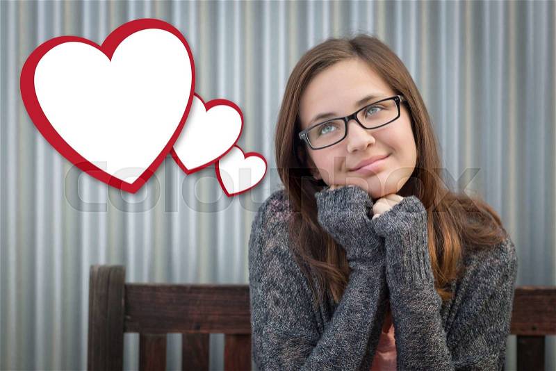 Cute Daydreaming Girl With Blank Floating Hearts Clipping Path Included, stock photo