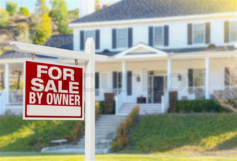 For Sale By Owner Real Estate Sign and Beautiful House, stock photo