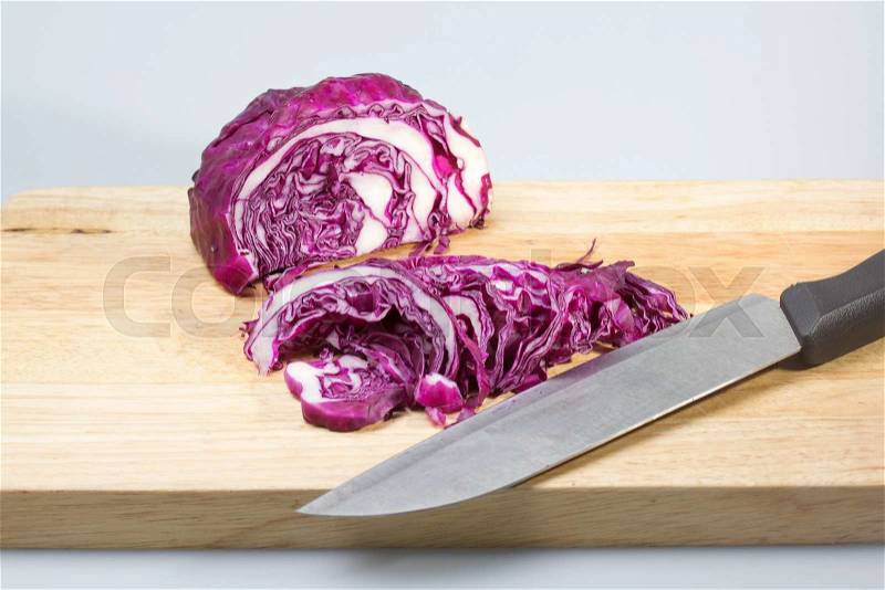 Purple cabbage / Slice of Purple cabbage on the wooden broad, stock photo