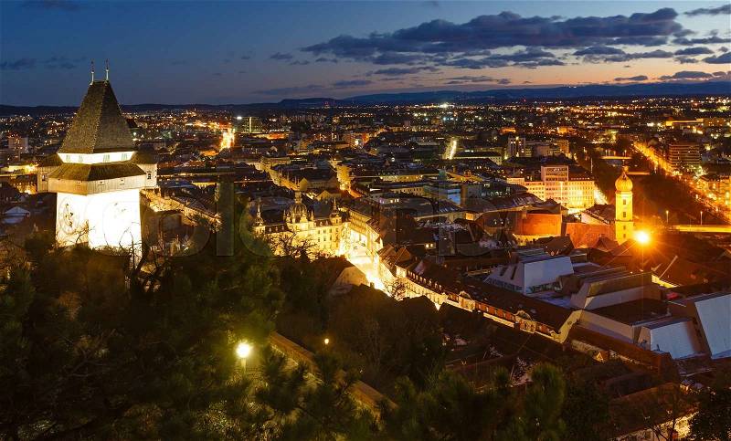 Graz city night top view with illuminated buildings (Austria), stock photo