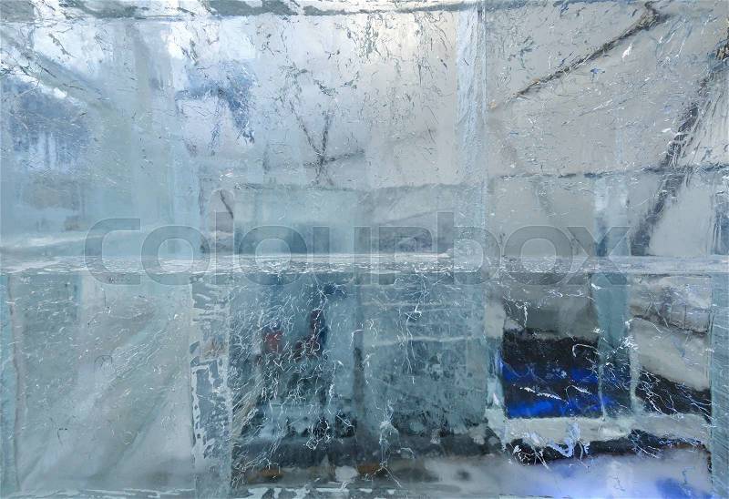 Large transparent blocks of ice with interesting drawings and patterns, stock photo