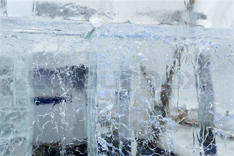 Large transparent blocks of ice with interesting drawings and patterns, stock photo