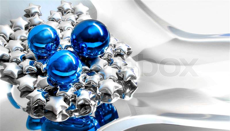 Modern style new year fantasy decoration setup with blue balls and silver stars, stock photo