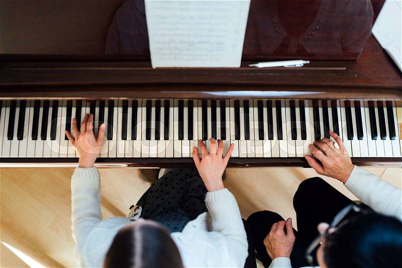Piano lesson at a music school, top view, stock photo