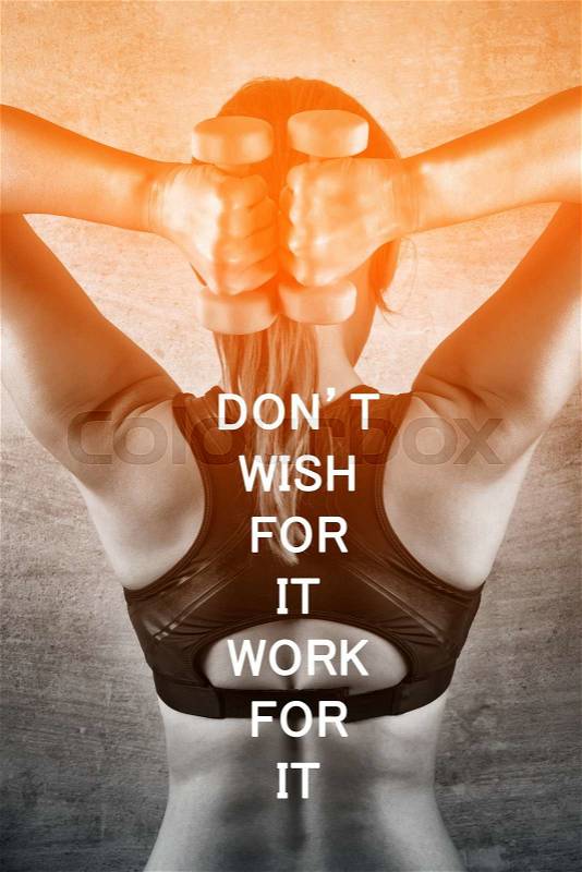 Don\'t wish for it work for it. Inspiration quote. Fit woman exercising with weights on the background of a concrete wall in the gym. Healthy lifestyle concept, stock photo