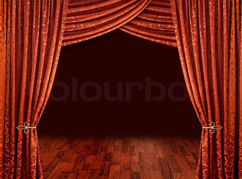 Red theatre stage curtains brown wooden floor and dark background, stock photo