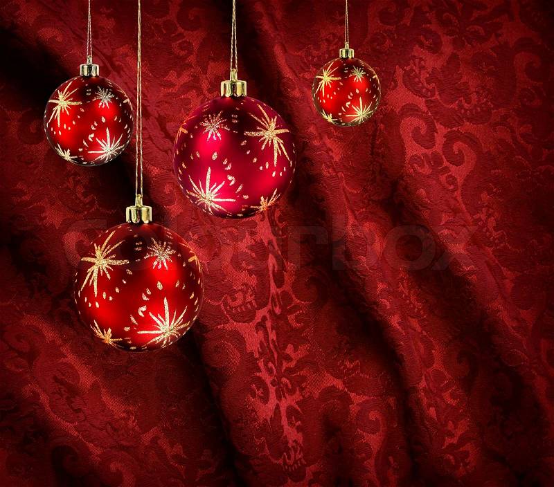 Red christmas balls on red velvet background  Stock Photo 