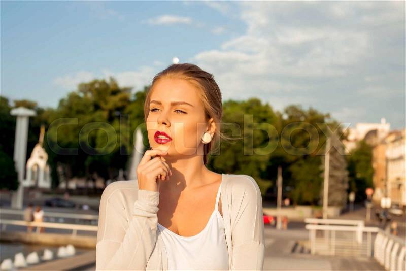 Young skinny sexy woman outdoor posing in summer in city. style, stock photo