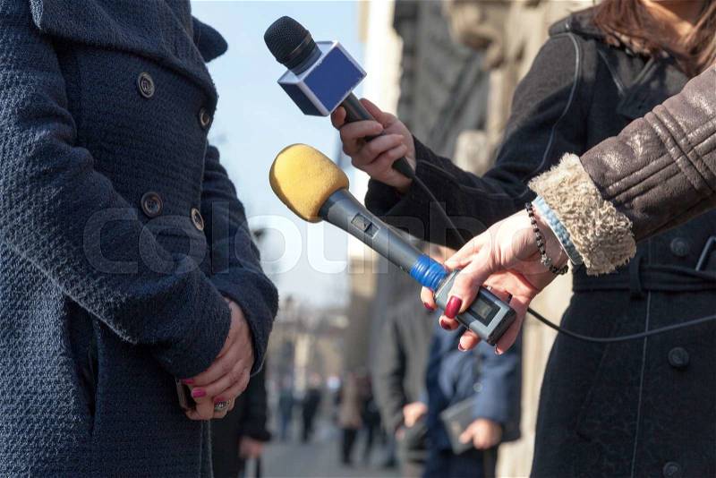 Press interview. News conference. Reporters, stock photo