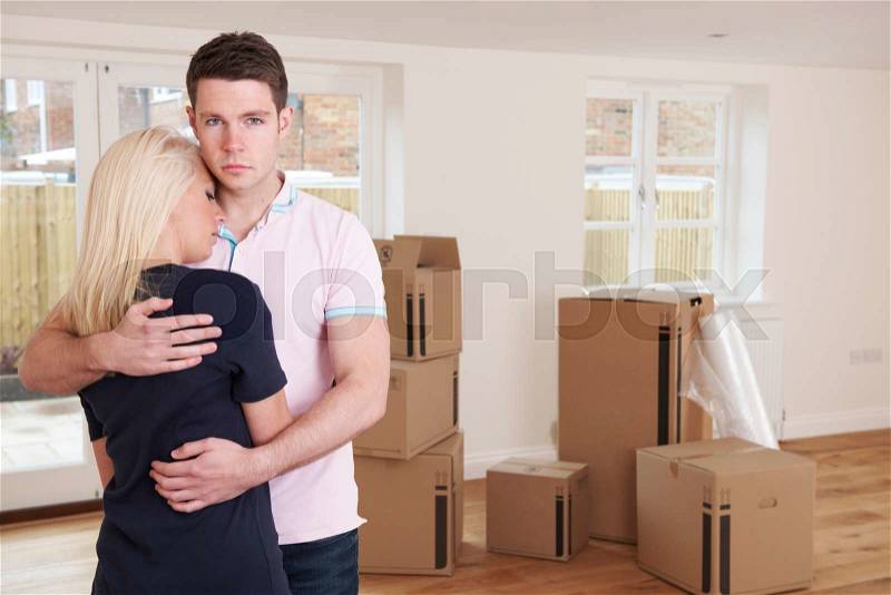 Young Couple Forced To Move Home Through Financial Problems, stock photo